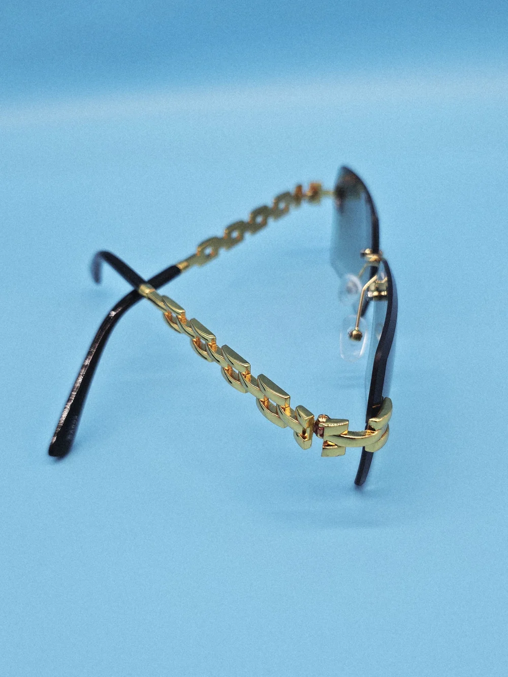 Gold-Accented Rimless Gray Sunglasses - Unisex Accessories